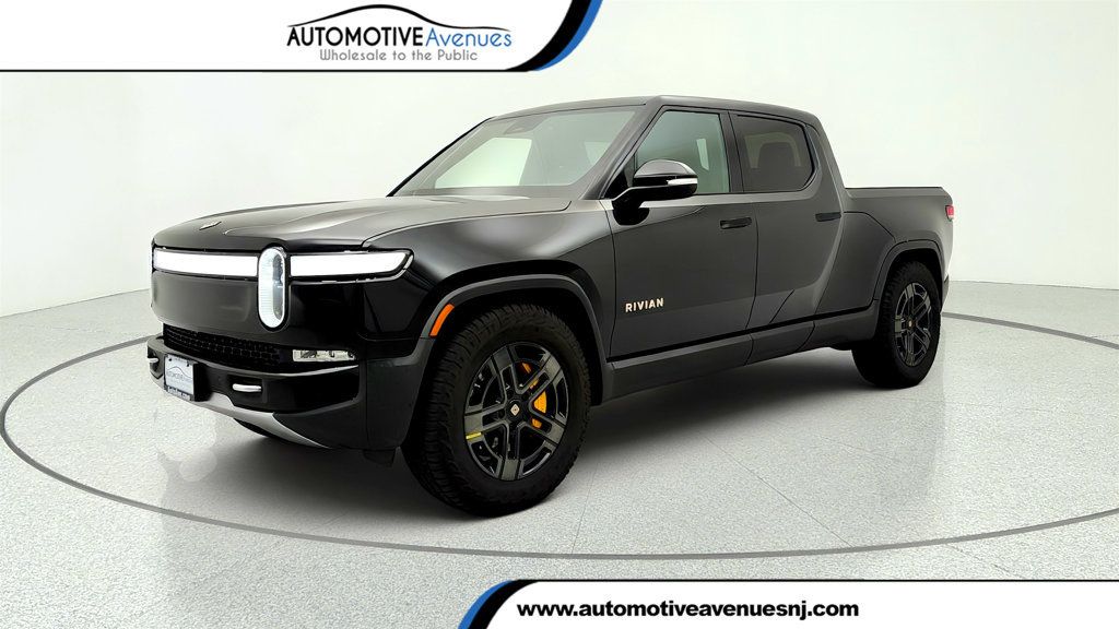 2023 Rivian R1T Adventure Quad-Motor Large Pack w/ 20’’ All Terrain Dark Wheels - 23032182 | Video 1