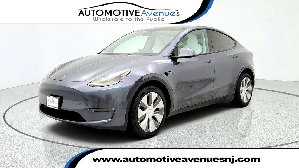 2023 Tesla Model Y AWD *Ltd Avail* w/ White & Black Premium Interior - 23083958 | Video 1