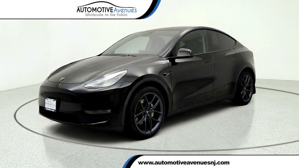 2023 Tesla Model Y Long Range AWD w/ 7-Seat Interior - 23055620 | Video 1