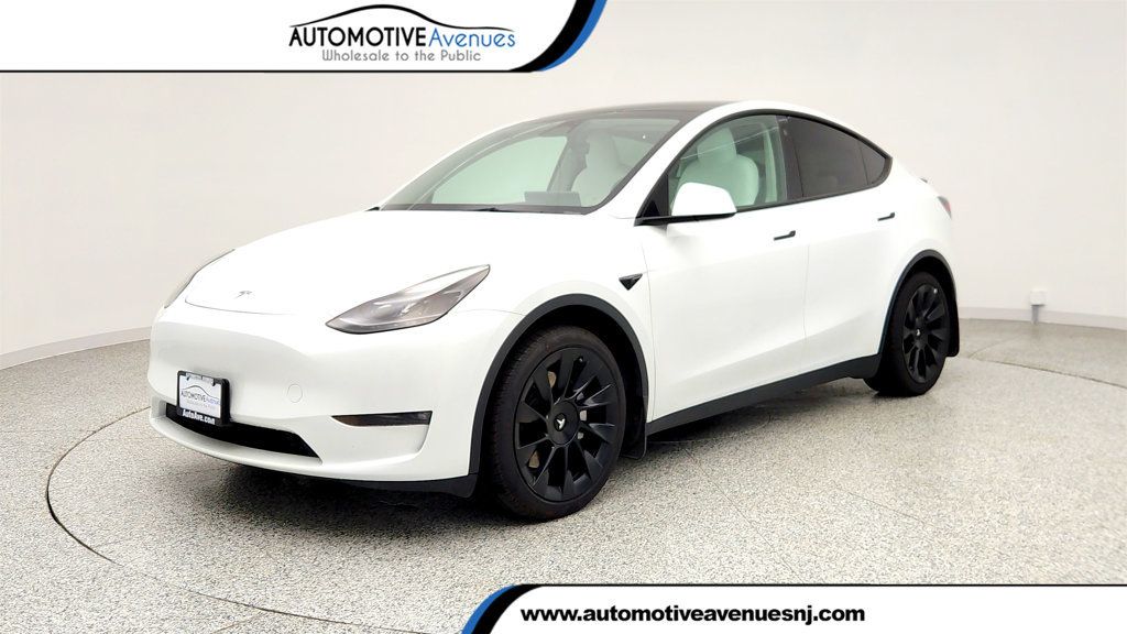 2023 Tesla Model Y Long Range AWD w/ 7-Seat White/Black Int. & 20'' Wheels - 23006184 | Video 1