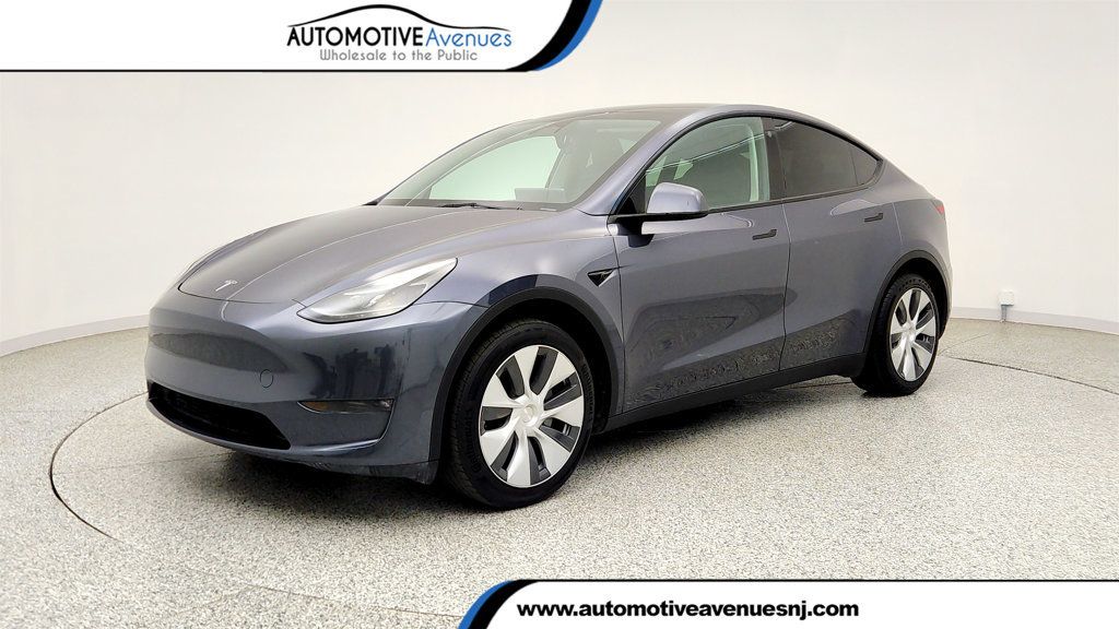 2023 Tesla Model Y Long Range AWD w/ Self-Driving, Acceleration Boost & 7 Seat Int. - 23024419 | Video 1