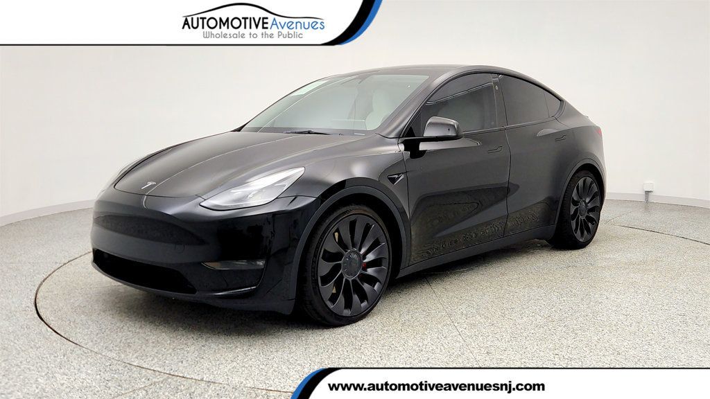 2023 Tesla Model Y Performance AWD w/ White & Black Premium Interior - 23000718 | Video 1