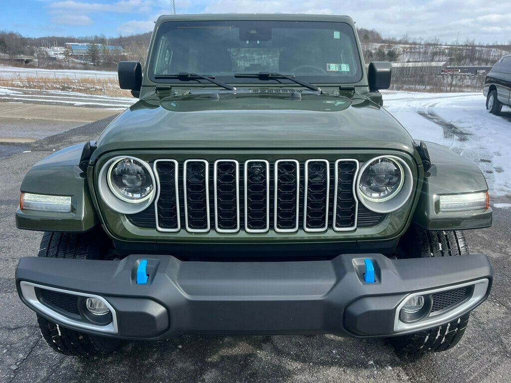 2024 Jeep Wrangler 4xe Sahara with Factory Hard Top and Soft Top $65,350 MSRP - 22986887 - 1