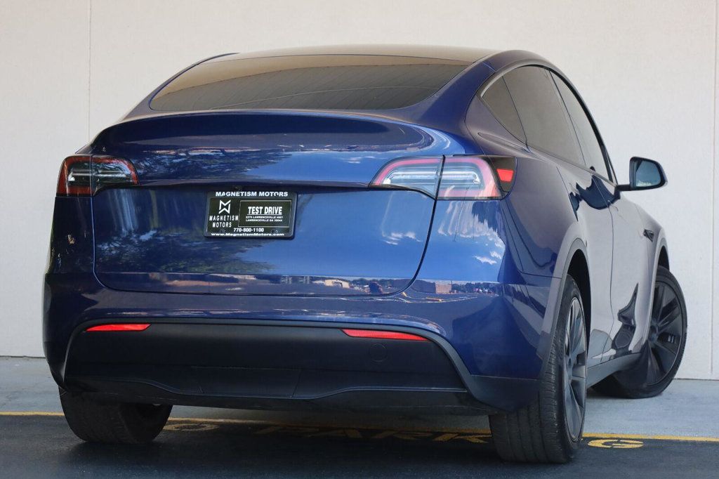 Tesla Model Y photo 11