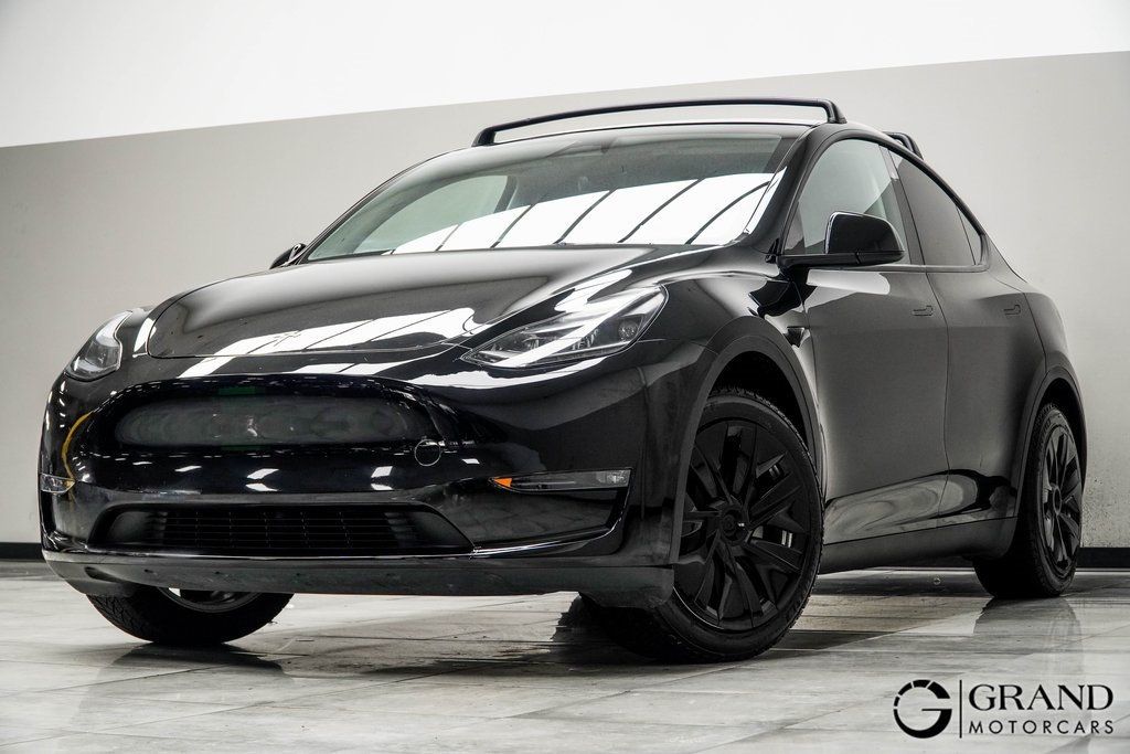 Used 2024 Tesla Model Y Long Range with VIN 7SAYGDEE6RA283884 for sale in Kennesaw, GA