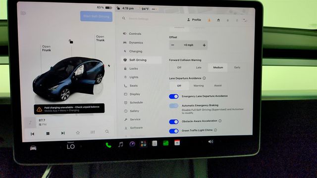 2024 Tesla Model Y Long Range AWD w/ White & Black Premium Interior - 23053785 - 19