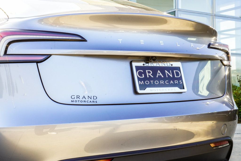 Tesla Model 3 photo 14