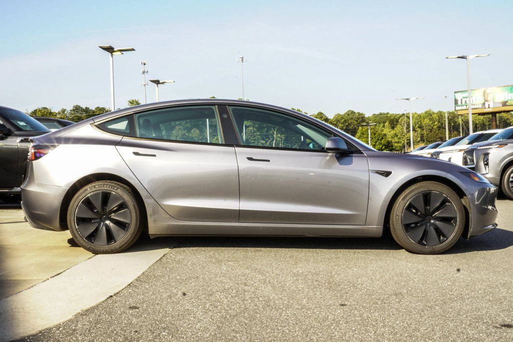 Tesla Model 3 photo 7